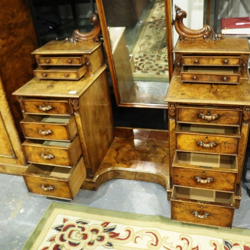 2124 - Mid 19th century burr walnut dresser, having a large swing mirror flanked by two pedestals of drawer... 