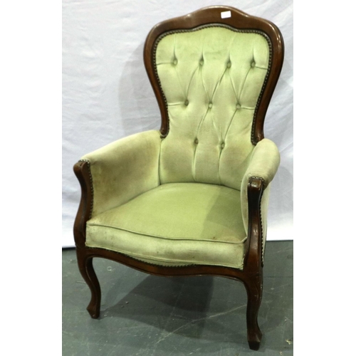 2126 - A late 19th/early 20th century gentlemans salon chair with stained pine frame and buttoned upholster... 