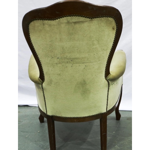 2126 - A late 19th/early 20th century gentlemans salon chair with stained pine frame and buttoned upholster... 