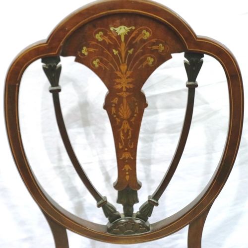 2129 - A Victorian inlaid walnut shield back parlour chair, with later upholstered seat, one leg with repai... 