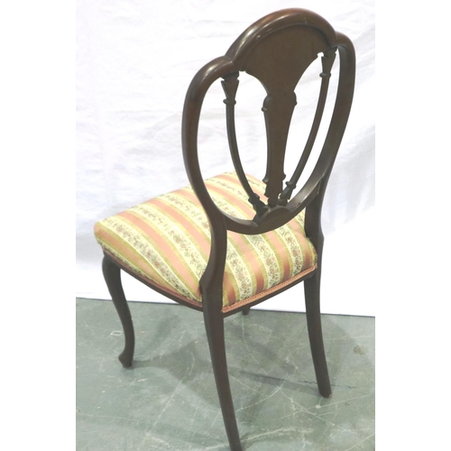 2129 - A Victorian inlaid walnut shield back parlour chair, with later upholstered seat, one leg with repai... 