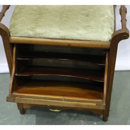 2130 - An Edwardian walnut piano stool, having drop-down front with fitted interior for sheet music and lat... 