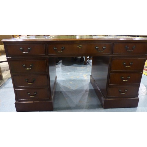 2077 - A 20th century reproduction mahogany twin pedestal desk with green tooled leather insert top. Not av... 