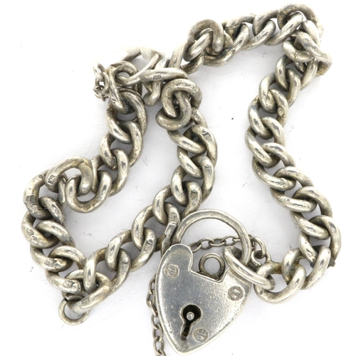 12 - William J Sutton, hallmarked silver curb chain bracelet with heart padlock and safety chain, Birming... 