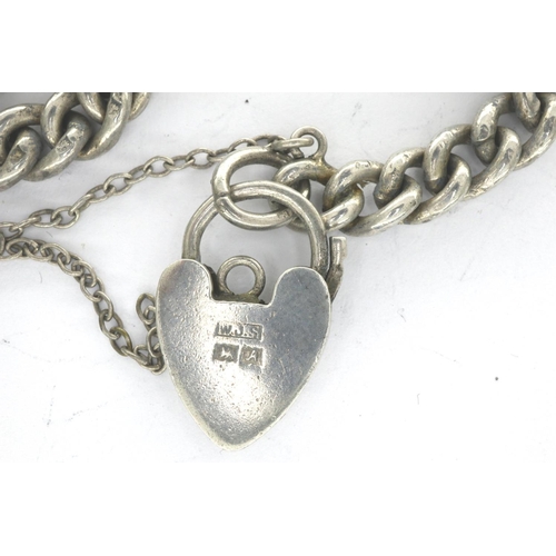 12 - William J Sutton, hallmarked silver curb chain bracelet with heart padlock and safety chain, Birming... 