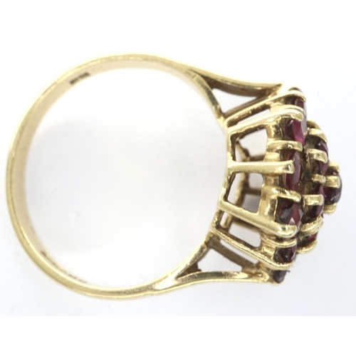 25 - 9ct gold cluster ring set with rubies, size R, 4.4g. Cluster of rubies measures, D: 20 mm, depth/hei... 