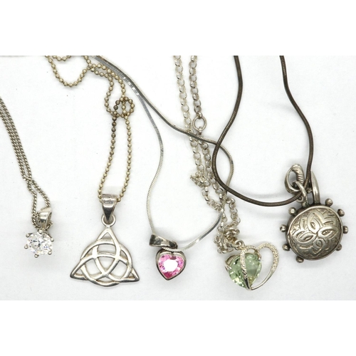 33 - Five silver pendant necklaces including stone set and hallmarked silver pendants, longest chain L: 5... 