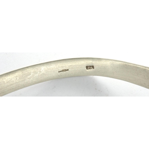 44 - Three 925 silver bangles including two torque examples, largest D: 70 mm. P&P Group 1 (£14+VAT for t... 