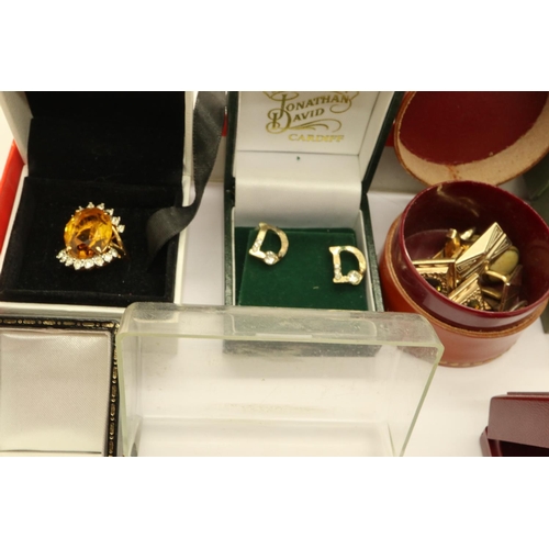 59 - Collection of mixed costume jewellery including earrings, rings and cufflinks, all boxed. P&P Group ... 