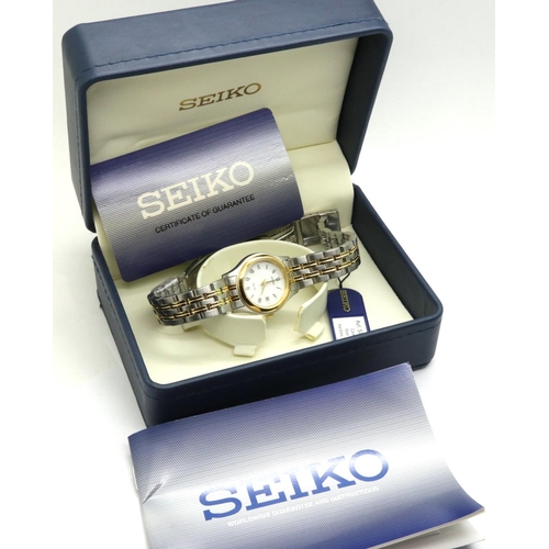 71 - SEIKO: Boxed SQ50 ladies wristwatch on a stainless steel and gold plated bracelet, not working at lo... 