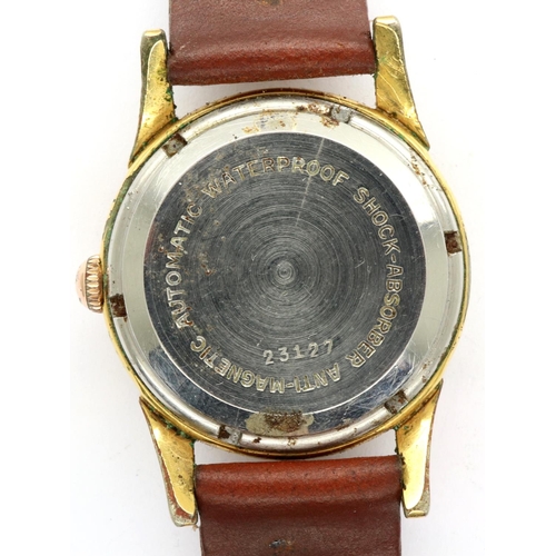 76 - ROAMER: gents automatic gold plated wristwatch, with circular dial on a brown leather strap, lens cr... 