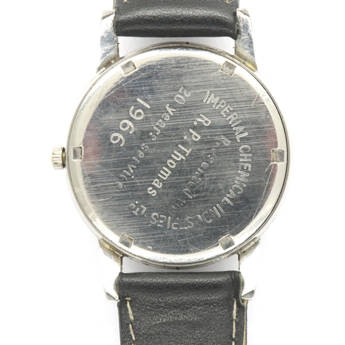 77 - GARRARD: gents steel cased manual wind wristwatch, with circular silvered dial on a black leather st... 