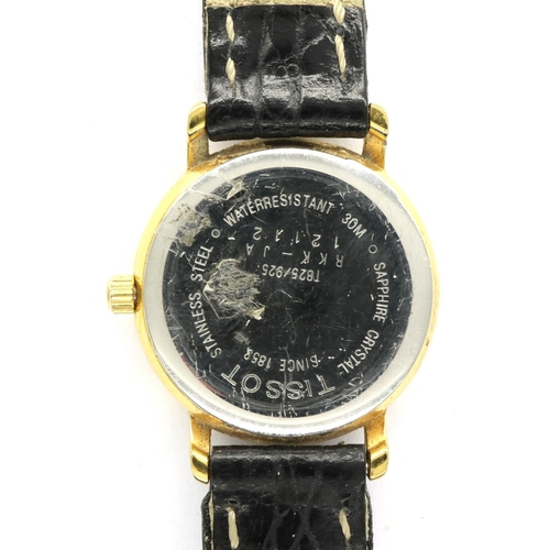 89 - Ladies Tissot model T 825/925 gold plated quartz wristwatch, works for a short time. P&P Group 1 (£1... 