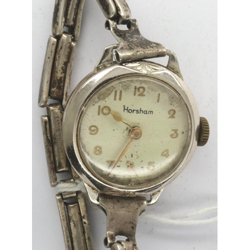 111 - HORSHAM: ladies chromium cased manual wind wristwatch, on a sterling silver expanding bracelet, not ... 