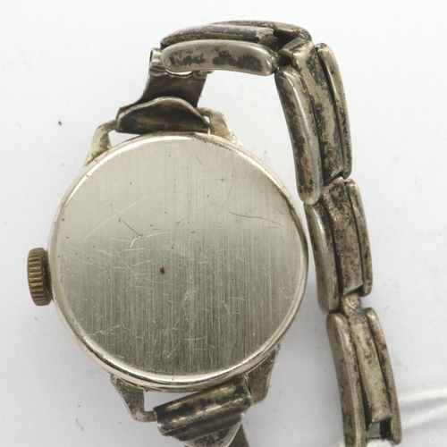 111 - HORSHAM: ladies chromium cased manual wind wristwatch, on a sterling silver expanding bracelet, not ... 