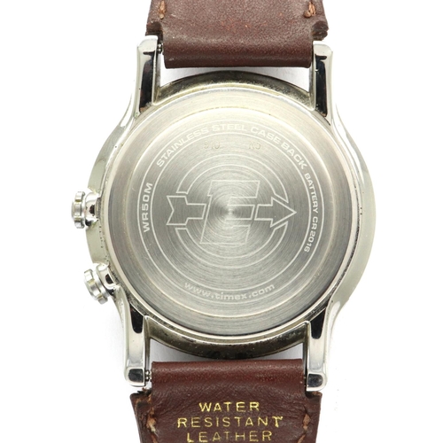 122 - TIMEX: EXPEDITION gents quartz wristwatch, with circular luminescent dial, date aperture on a brown ... 