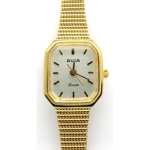 124 - AVIA: ladies gold plated quartz wristwatch, with lozenge shaped champagne dial and on a gold plated ... 