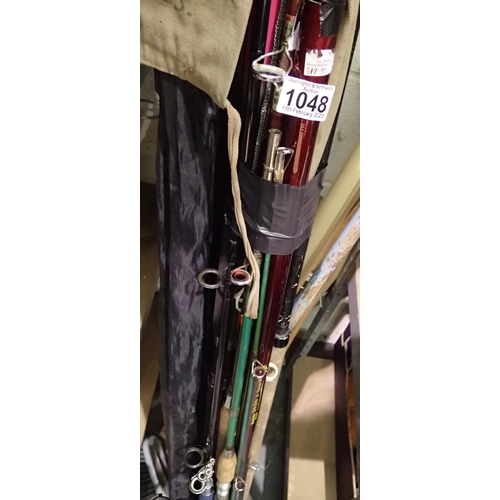 1048 - Mixed fishing rods and bags. Not available for in-house P&P