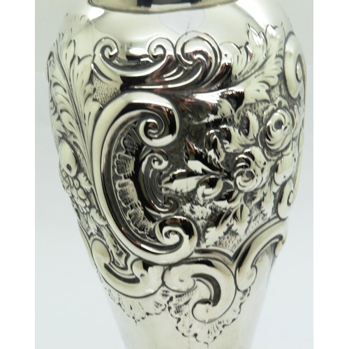 154 - Hallmarked silver vase with embossed filigree decoration, London assay 1890, H: 21 cm, 256g. P&P Gro... 