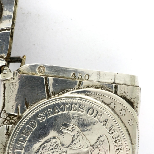 172 - Sterling silver vesta case embossed with an American silver half dollar, a quarter dollar and silver... 