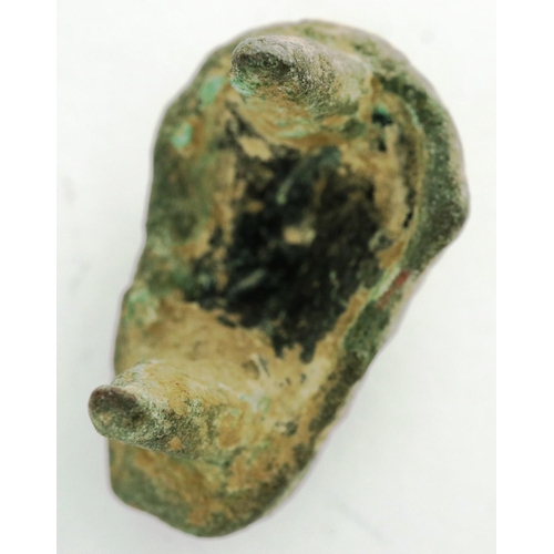 199 - Bronze Age boss head depiction of male bust, L: 16 mm. P&P Group 0 (£5+VAT for the first lot and £1+... 