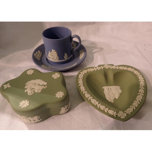 1205 - Four pieces of Wedgwood Jasperware including a cup and saucer. P&P Group 2 (£18+VAT for the first lo... 