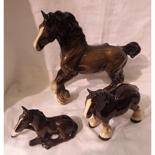 1207 - Three ceramic horses to include Beswick, Royal Doulton and another. P&P Group 3 (£25+VAT for the fir... 