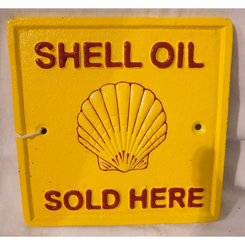 1209 - Cast iron Shell Sold Here plaque, W: 15 cm. P&P Group 1 (£14+VAT for the first lot and £1+VAT for su... 