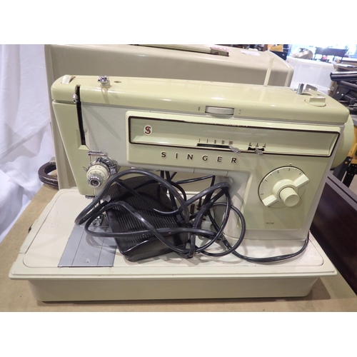 1345 - Cased electric Singer sewing machine. Not available for in-house P&P