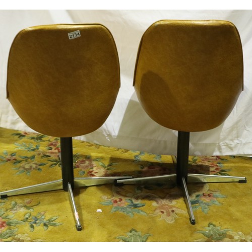 2134 - Pair of 1970s faux leather swivel chairs on four arm chrome base. Not available for in-house P&P