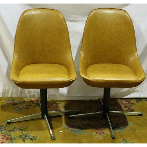 2134 - Pair of 1970s faux leather swivel chairs on four arm chrome base. Not available for in-house P&P