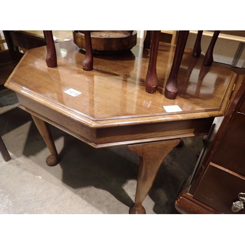 1415 - Octagonal mahogany table, 75 x 50 cm, and a Victorian upholstered footstool. Not available for in-ho... 