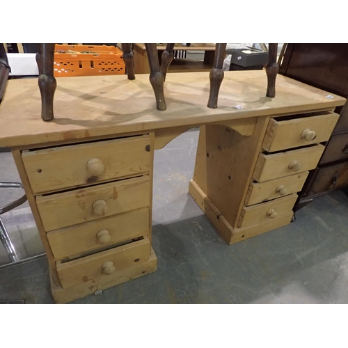 1479 - Pine twin pedestal desk with four drawers to each pedestal, 130 x 50 x 75 cm H. Not available for in... 