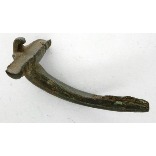 234 - Early Iron Age ornate bow fibula, L: 42 mm. P&P Group 0 (£5+VAT for the first lot and £1+VAT for sub... 