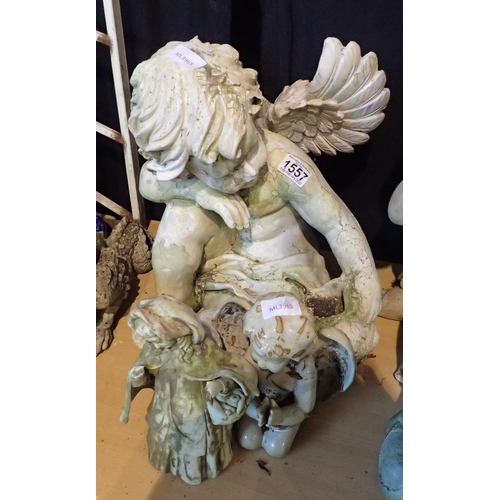 1557 - Three cherub garden ornaments, largest H: 50 cm. Not available for in-house P&P