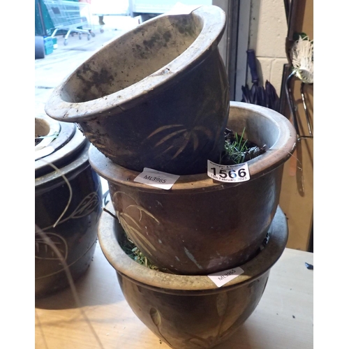 1566 - Three graduated garden pots, largest H: 35 cm. Not available for in-house P&P