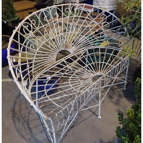 1575 - White painted garden trellis and a matching two seater metal chair. Not available for in-house P&P