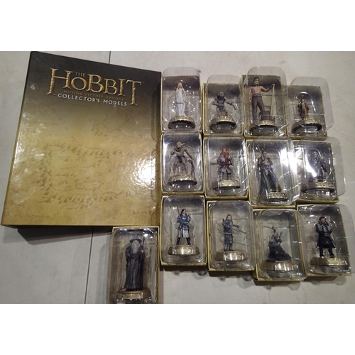 2038 - Thirteen cast resin Hobbit figurines and related paperwork. P&P Group 1 (£14+VAT for the first lot a... 