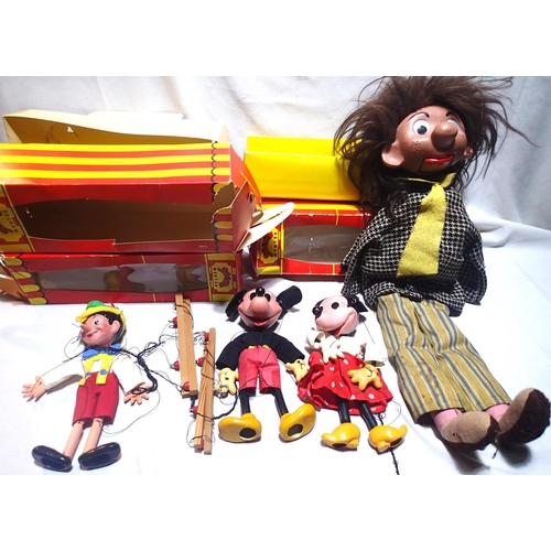 2054 - Three Pelham Puppets to include Pinocchio, Mickey Mouse and Minnie Mouse all in very good condition,... 