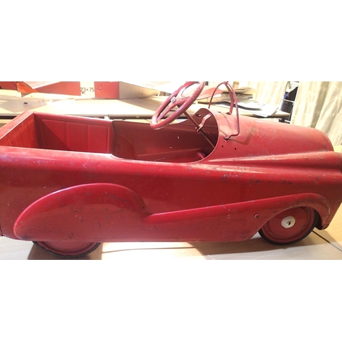 2059 - Vintage tinplate childs pedal car, has been overpainted, suitable for re-furbishment. Not available ... 