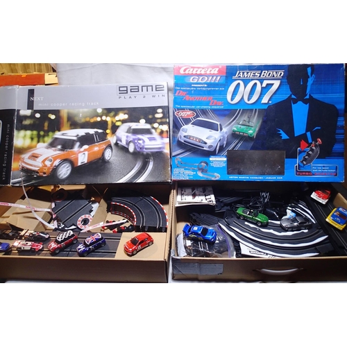 2060 - Two Carrera Go slot car machine sets to include James Bond Die Another Day and Mini Cooper racing, a... 