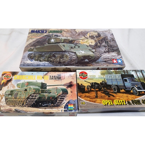 2123 - Three military related kits to include Tamiya 1/35 scale M4A3E2 Jumbo, Airfix 1/72 scale Churchill t... 