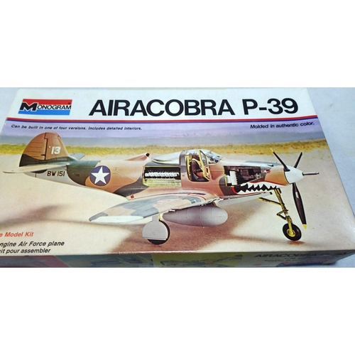 2126 - Monogram 1/48 scale Airacobra P-39 kit, appears complete/unchecked and box has wear. P&P Group 1 (£1... 