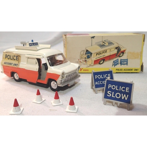 2208 - Dinky Toys 287 police transit van in excellent condition, apart from one peeling decal and missing a... 