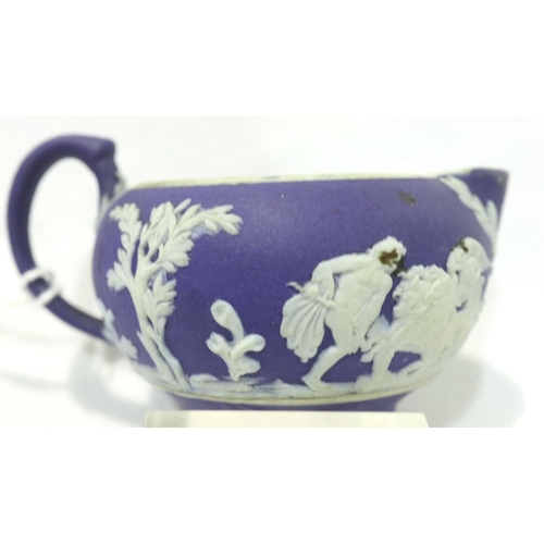 1130 - Miniature Wedgwood Jasperware jug, H: 20 mm, dark blue background with applied white figures. P&P Gr... 