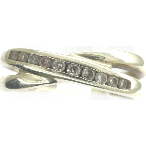 15 - 9ct gold crossover ring set with diamonds, size M, 2.4g. P&P Group 1 (£14+VAT for the first lot and ... 