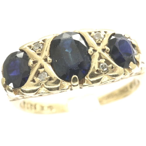 23 - 9ct gold ring set with sapphires and diamonds, size M, 3.1g. P&P Group 1 (£14+VAT for the first lot ... 