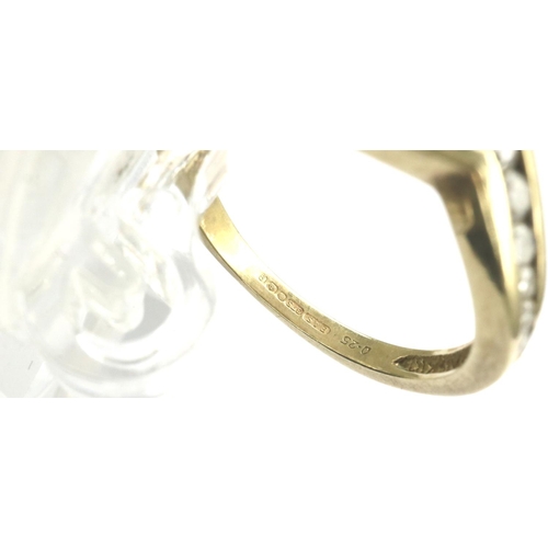 27 - 9ct gold wishbone ring set with eleven diamonds, size M, 2.4g. P&P Group 1 (£14+VAT for the first lo... 