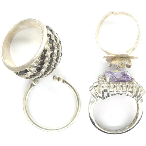 45 - Four 925 silver rings including stone set examples, size L-S. P&P Group 1 (£14+VAT for the first lot... 