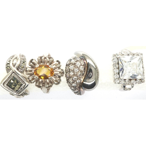 54 - Four 925 silver rings including stone set examples, sizes M-O. P&P Group 1 (£14+VAT for the first lo... 